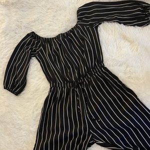Black and white pinstriped jumpsuit